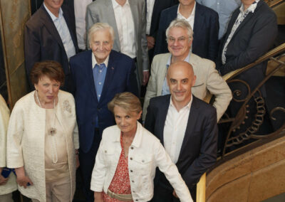 La photographie officielle du jury du 21e Prix Jacques-Goddet – Trophée Amaury Sport Organisation. Au premier rang, de gauche à droite, nous pouvons reconnaître : Roselyne Bachelot, Natacha Tatu, Xavier Jan ; au deuxième rang, Jean-Claude Trichet, Christophe Penot ; au troisième rang : Sébastien Grosmaitre, Christian Prudhomme, Jean-Étienne Amaury, Laurent-Éric Le Lay, Julien Goupil, Fabrice Tiano, Henri Montulet.